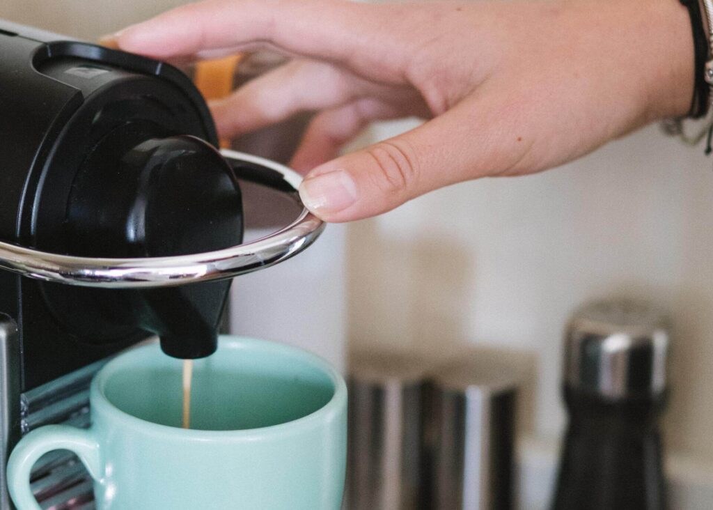 brewing coffee with nespresso machine