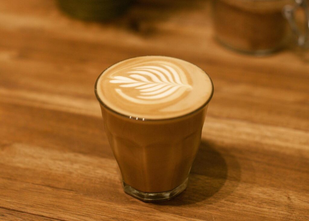 caffe latte on brown bg