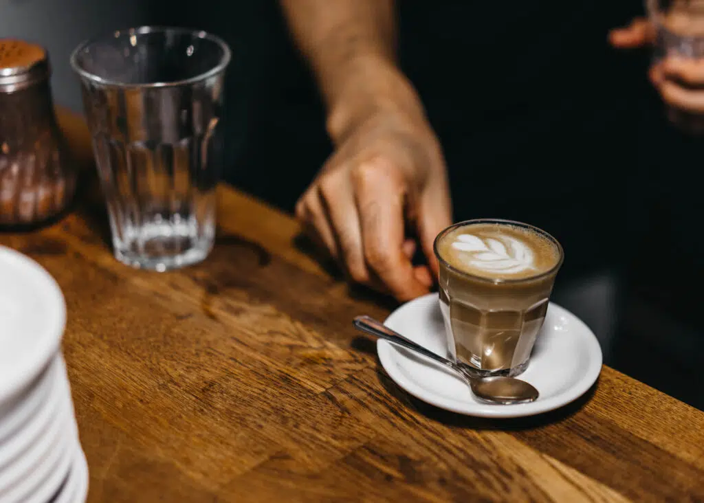 ordering cortado at coffee shop