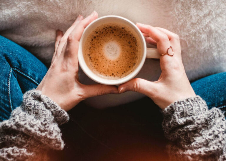 cooling down coffee in a cup