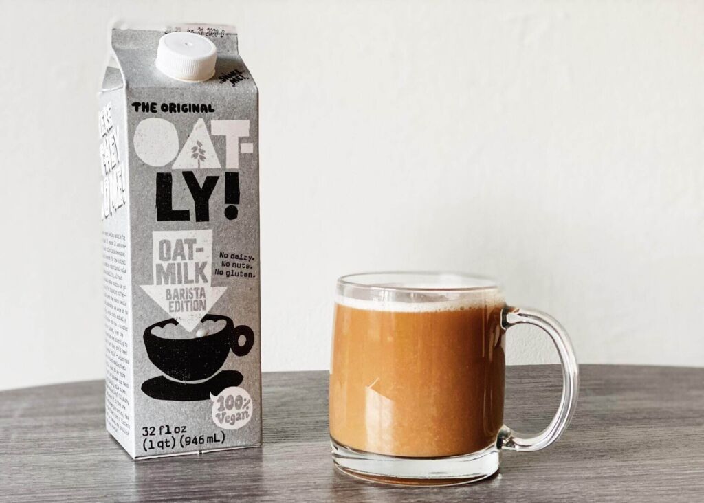 carton of oatly milk and coffee