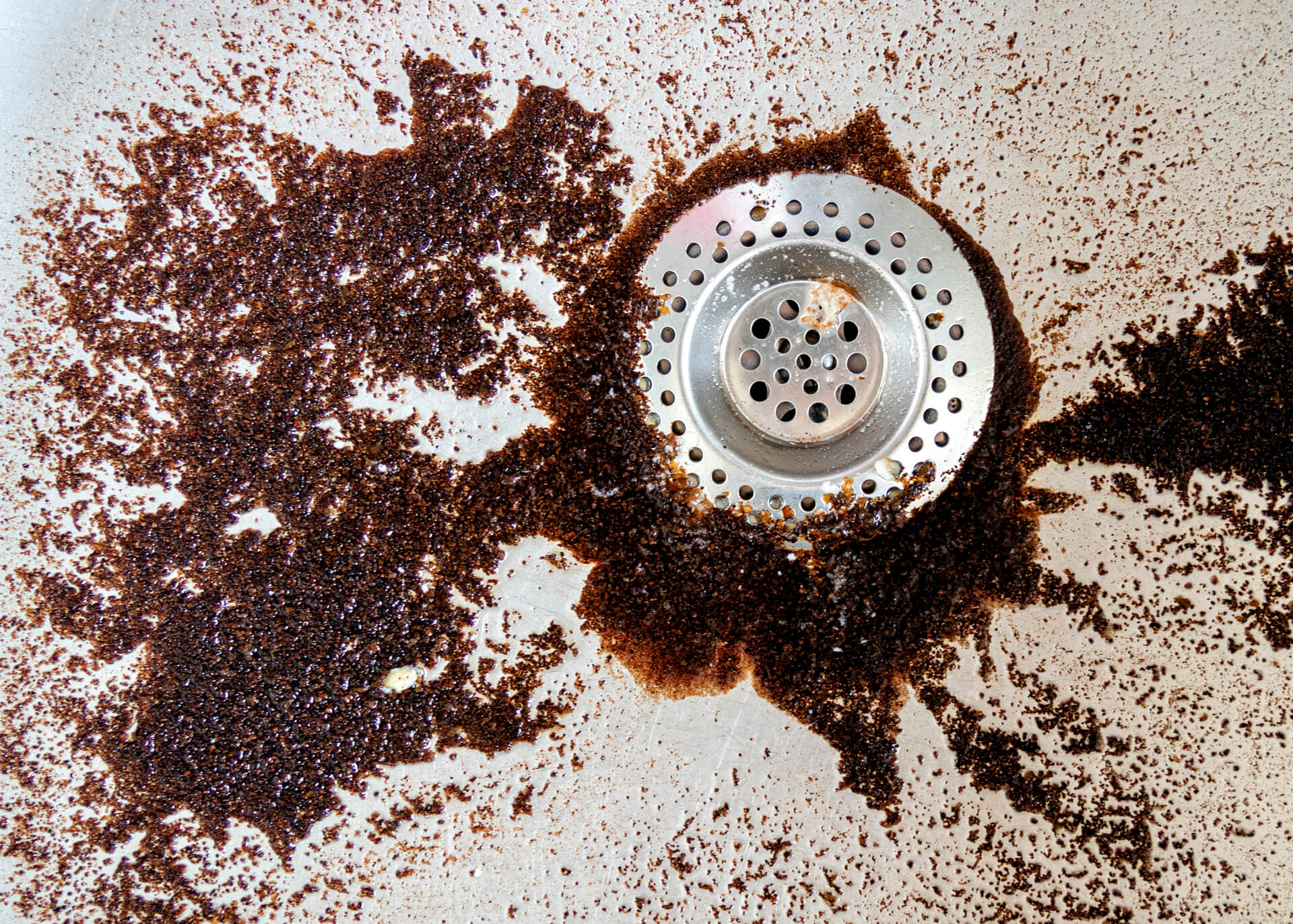 What Dissolves Coffee Grounds? Top Tips to Unclog Your Sink • Crazy