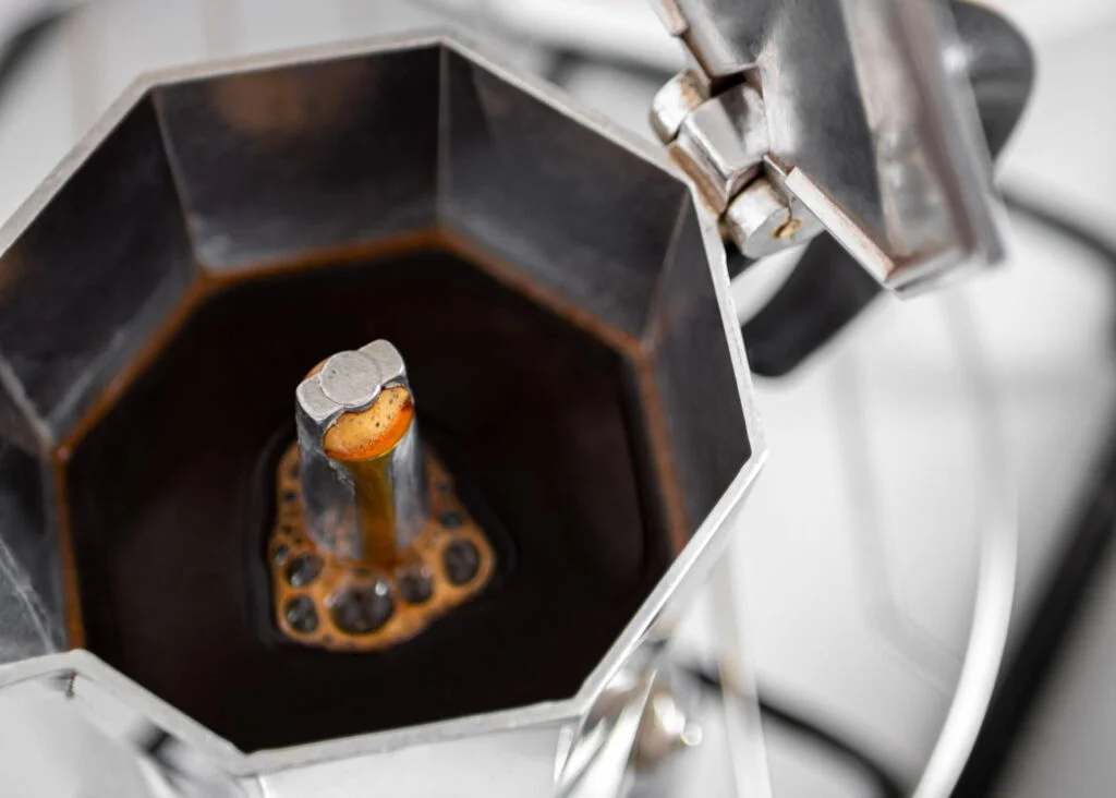 moka pot brewing coffee