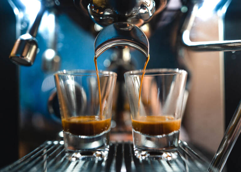 espresso machine brewing two shots of espresso