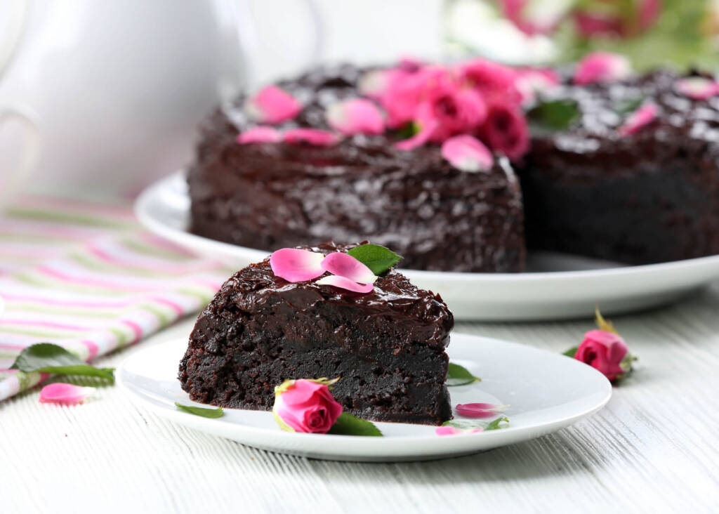 chocolate cake decorated with rose petals